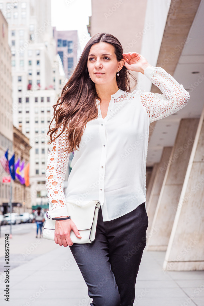 White long sleeve top with black pants
