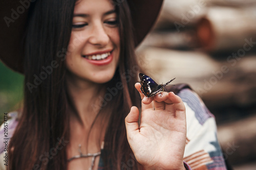 Photography beautiful butterfly on girl hand