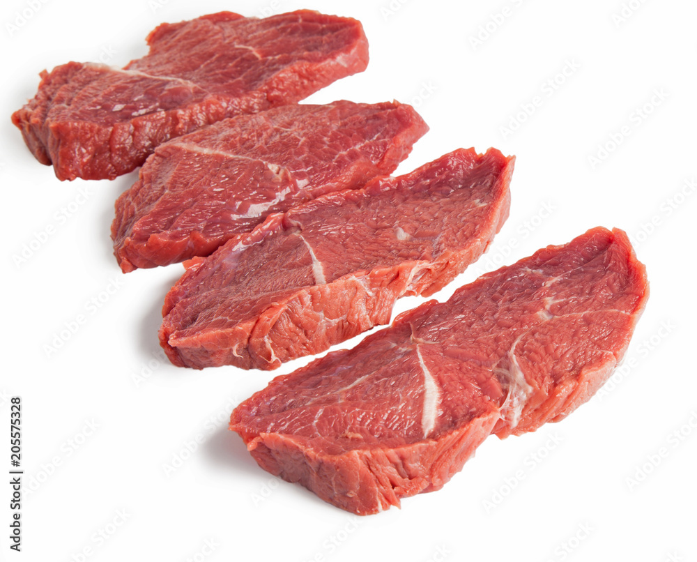 Raw beef meal isolated on a white background. Top view.	
