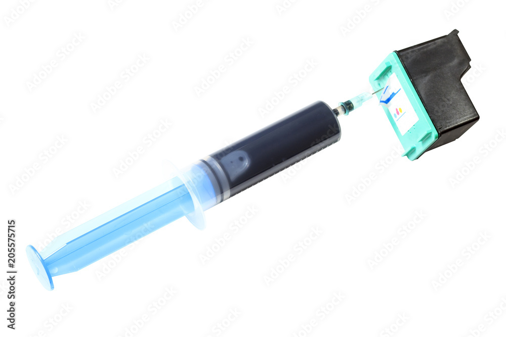 A syringe in the ink supply device of the printer. Close-up. Isolated white background A syringe in the ink supply device of the printer. Close-up. Isolated white background