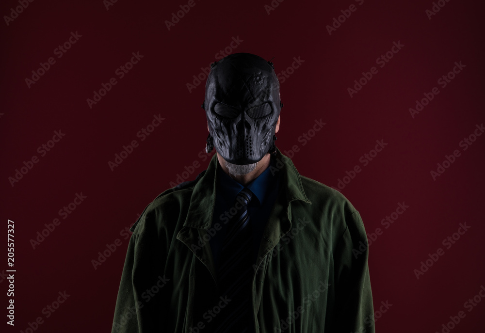 shadow portrait of a man in a black mask shadow portrait of a man in a black mask