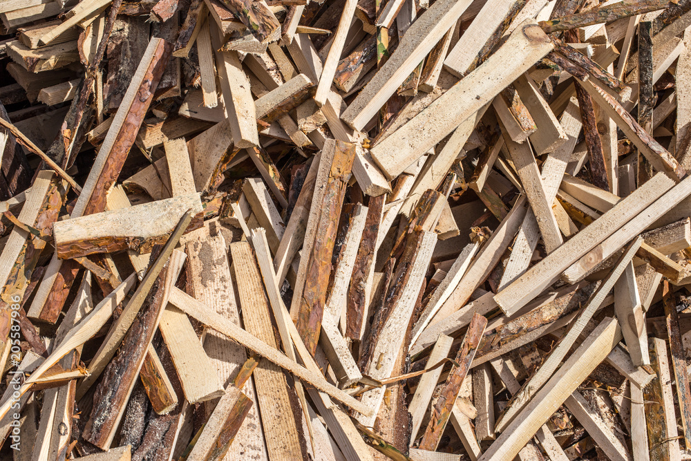 The background of wooden boards is chaotic in the pile. The background of wooden boards is chaotic in the pile.
