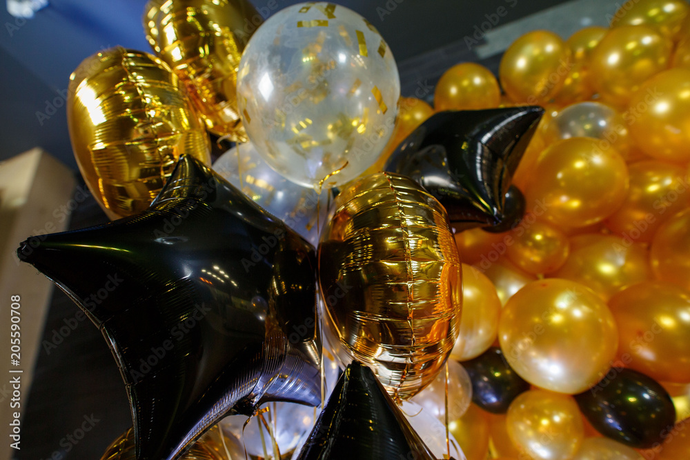 golden and black balloons.
The photo zone is decorated with black and yellow balloons .
round golden balloon.
 balloon in the form of a star.
stylish party with balloons.