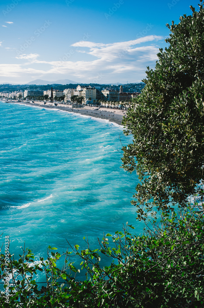 Beautiful green mediterranean nature and azur sea in the promenade des anglais view from the Quai Rauba Capeu Nice,France