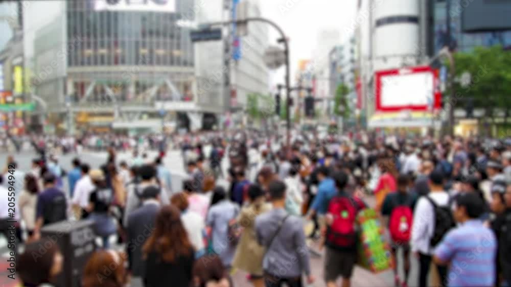 Blurred video of people walking the Shibuya crossing, probably the busiest pedestrian crossing in the world, Tokyo, Japan Blurred video of people walking the Shibuya crossing, probably the busiest pedestrian crossing in the world, Tokyo, Japan