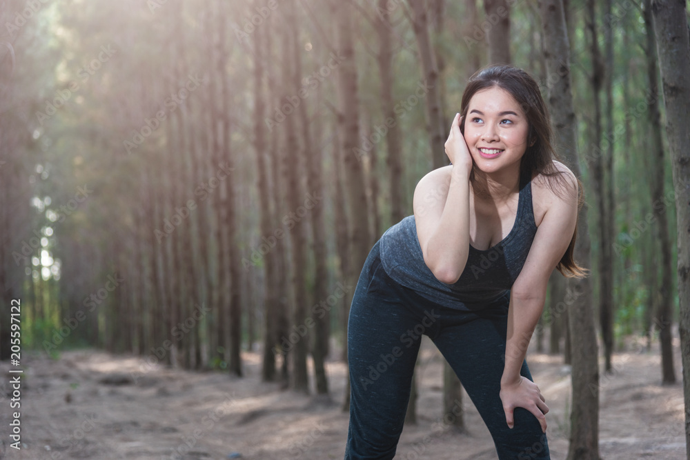 Beautiful sport young woman female lifestyle tired after running workout Beautiful sport young woman female lifestyle tired after running workout