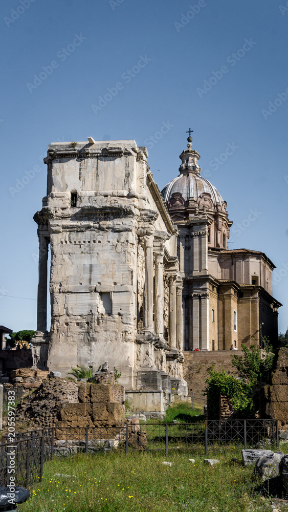 Arch of Septimius Severus and Curia Julia in the Roman Forum, Rome, Italy