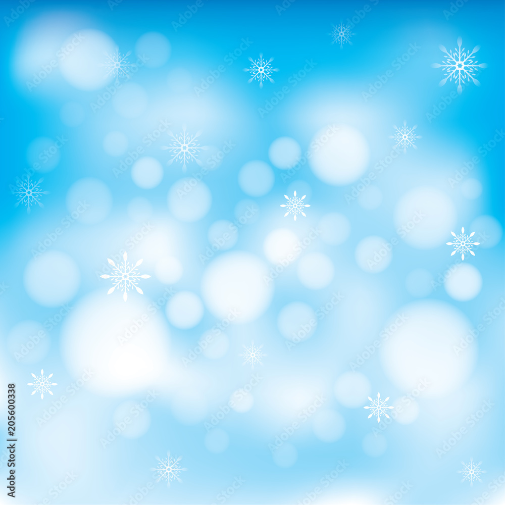 Background blue bokeh with snowflakes for Christmas holiday.