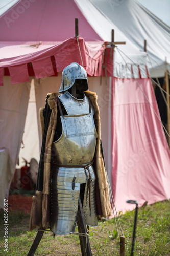 Medieval Metallic Armor and Ancient Tent in background
