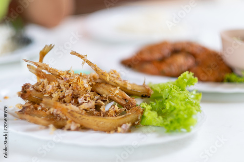Canvas-taulu Small fried fish and skirt garlic pepper, This would be served as a starter or t