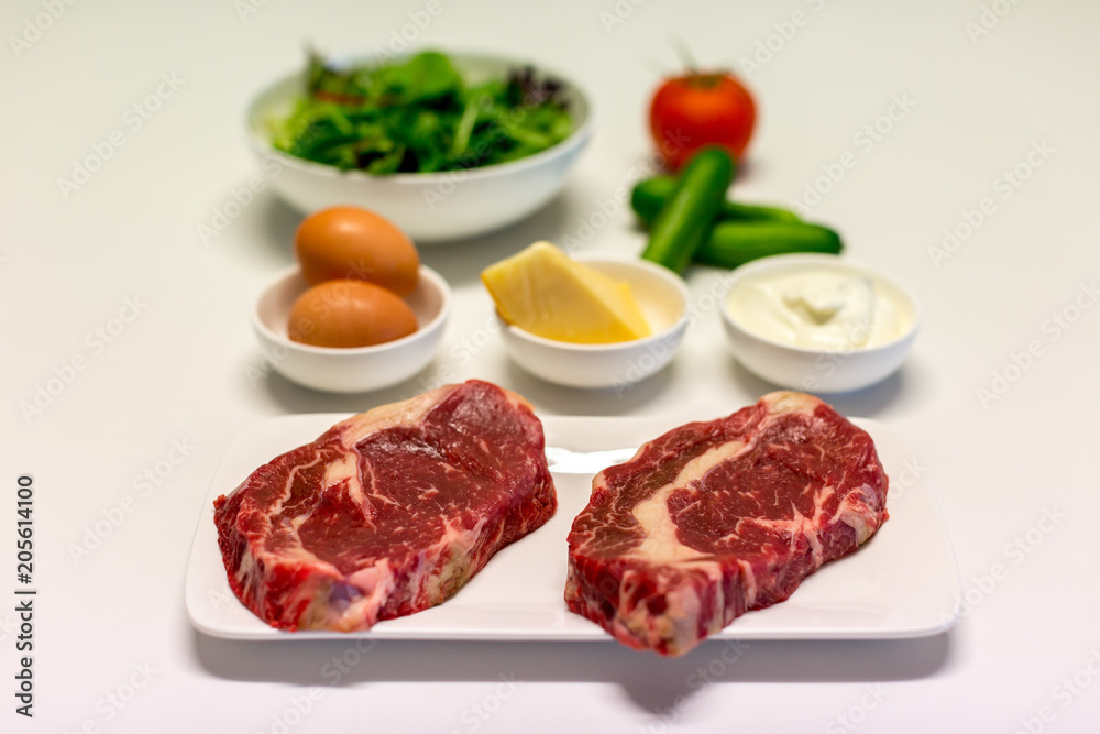 scotch fillet steak with other ingredients ready to cook a meal