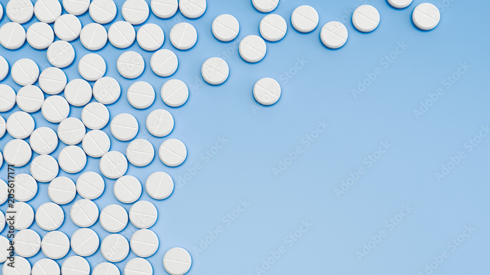Pills on blue background