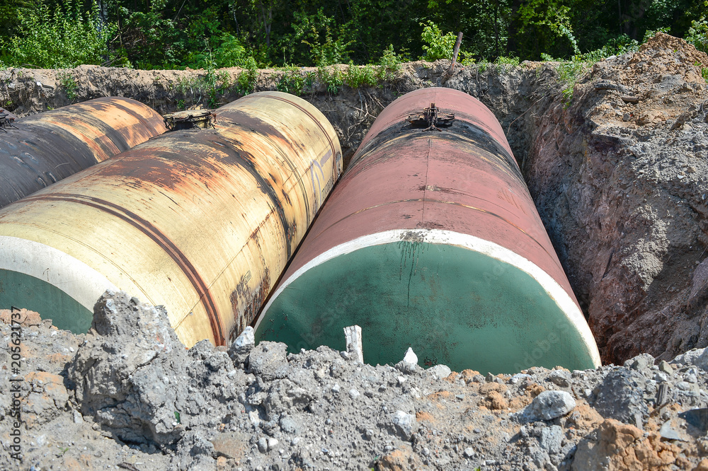 Large tank for gasoline in the excavated quarry for storage of petroleum products Large tank for gasoline in the excavated quarry for storage of petroleum products