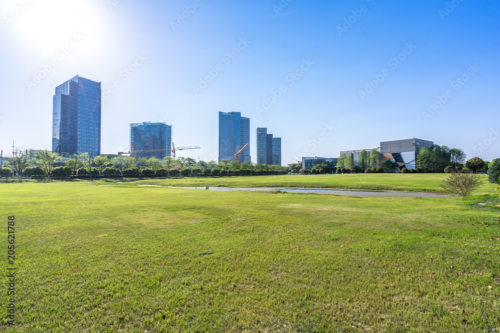 modern office building with green lawn in park