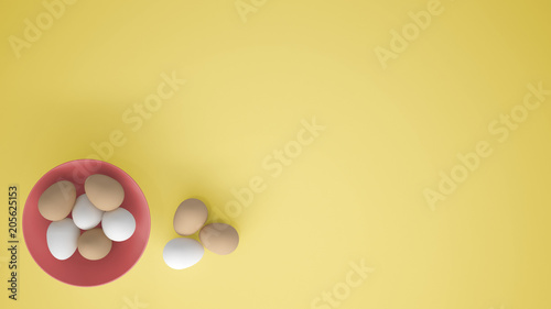 Chicken eggs into a pink cup on the table, yellow background with copy space, breakfast easter food concept idea, top view