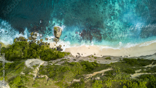Aerial rocky cliff coastline top view