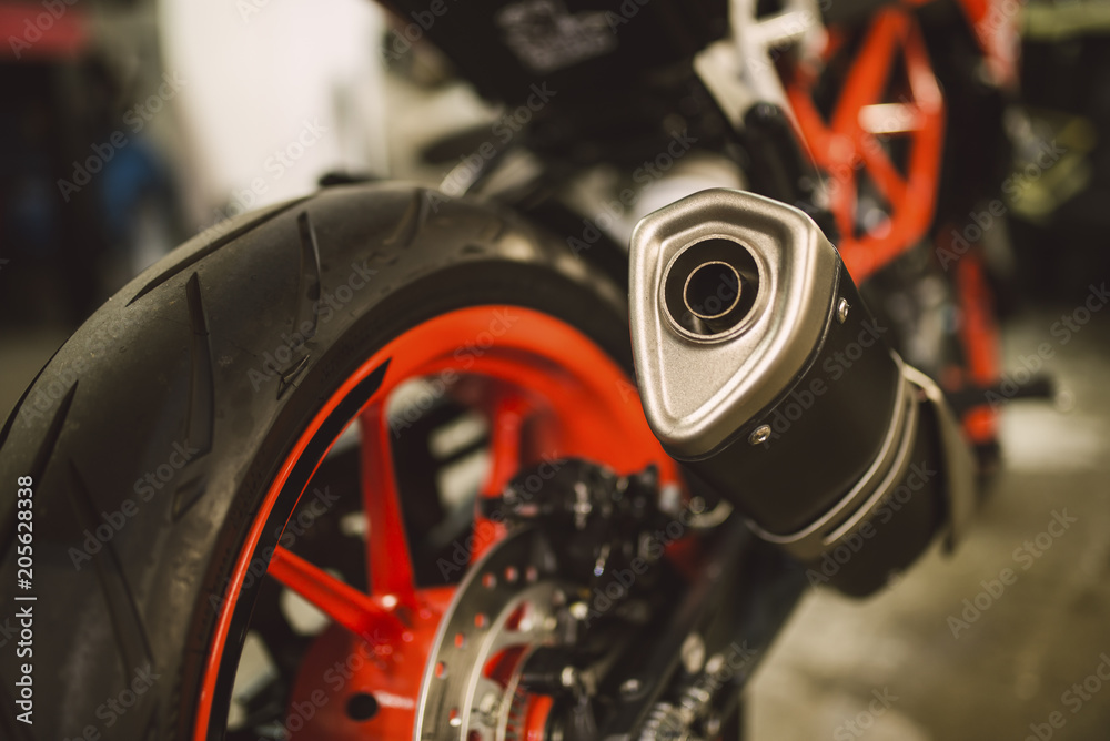 Naklejka premium Detail of the exhaust pipe of a motorbike