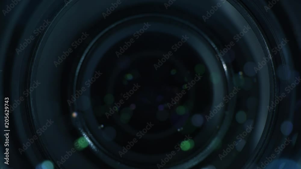 Close up of camcorder lens zooming, modern digital camera optical element