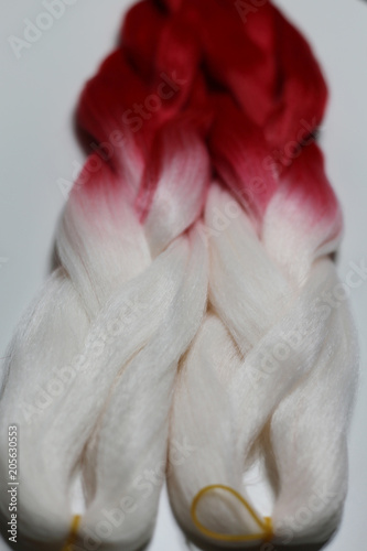 kanekalon, hair artificial for weaving braids, colored ribbons ombre gradient colors, white-red photo