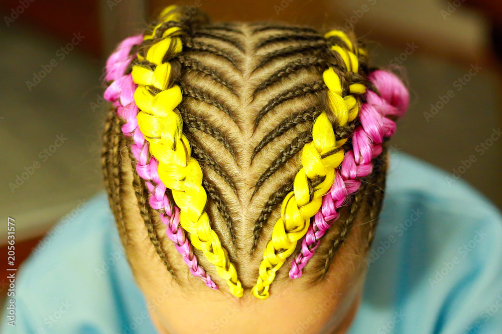 creative hairstyle of thin and thick plaits with interweaving neon hair kanekalon