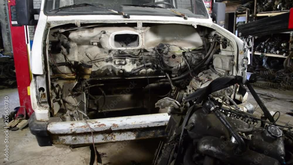 disassemble the motor from the car
