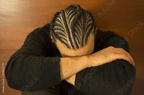 Male hairstyle close-up of the head without a face, corn rows, hair pattern, youth African hairdo