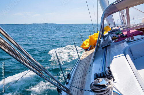 View from luxurious sailboat sailing through the ocean. © Oleg