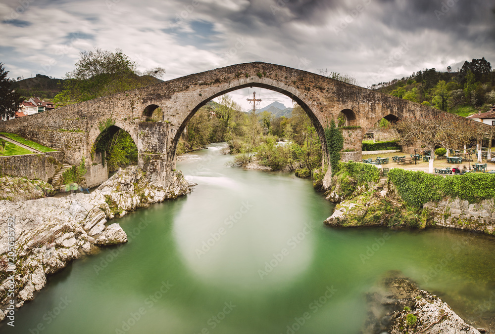 Old Roman stone bridge in Cangas de Onis (Asturias), Spain.
