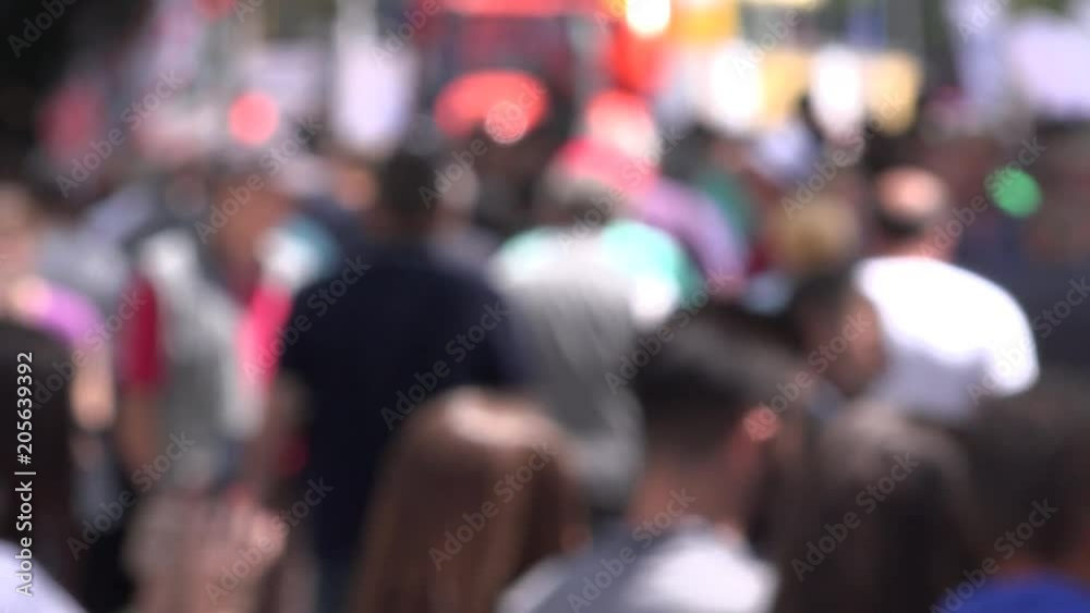 Abstract blur people crowd walking on street, blurry backdrop Abstract blur people crowd walking on street, blurry backdrop