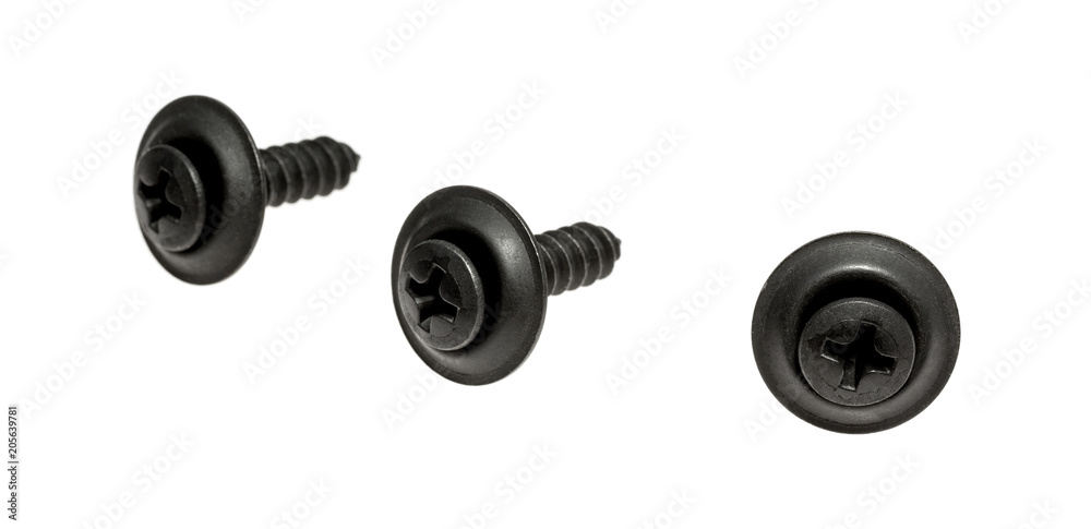 Three black trim head screws isolated on a white background. Three black trim head screws isolated on a white background.