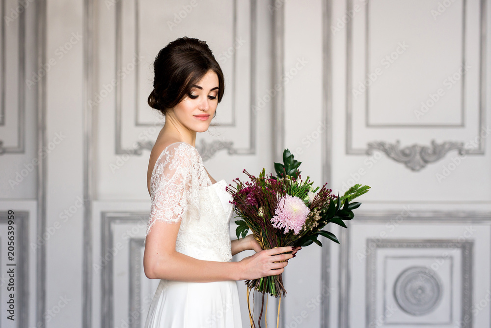 Wedding fashion bride with bouquet in hands Wedding fashion bride with bouquet in hands