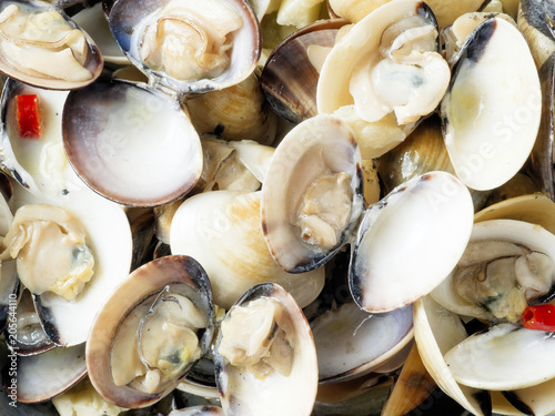 rustic italian vongole clams in white wine sauce food background