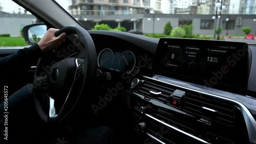 View of modern car dashboard while driving car. photo