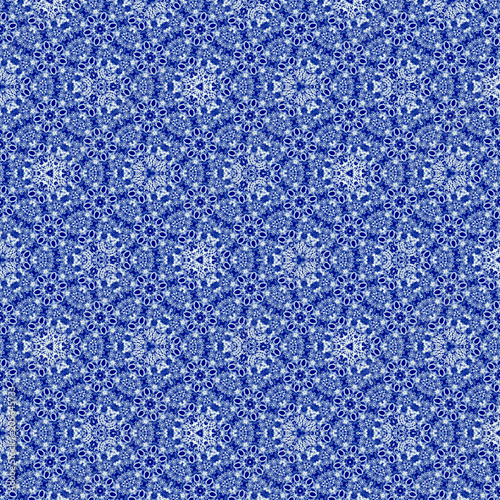 Continuous pattern with effect of embroidery richelieu in blue gzhel color, very nice pattern for textile and fabric photo