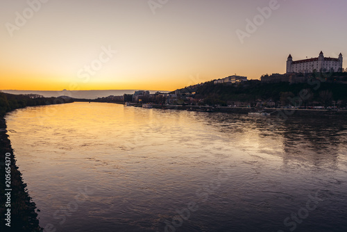 Photography Sunset over Danube River with castle in Bratislava city, capital of Slovakia