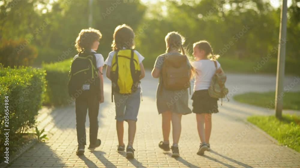 Four Friends Are Going to School. They Have A Lot of Fun Because Today is Their First Day at School.