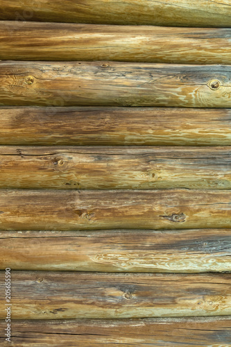 The old wooden wall of natural color. Texture.