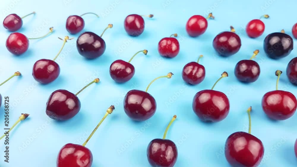 Sweet cherry fruit on pastel blue background. Sweet cherry fruit on pastel blue background.