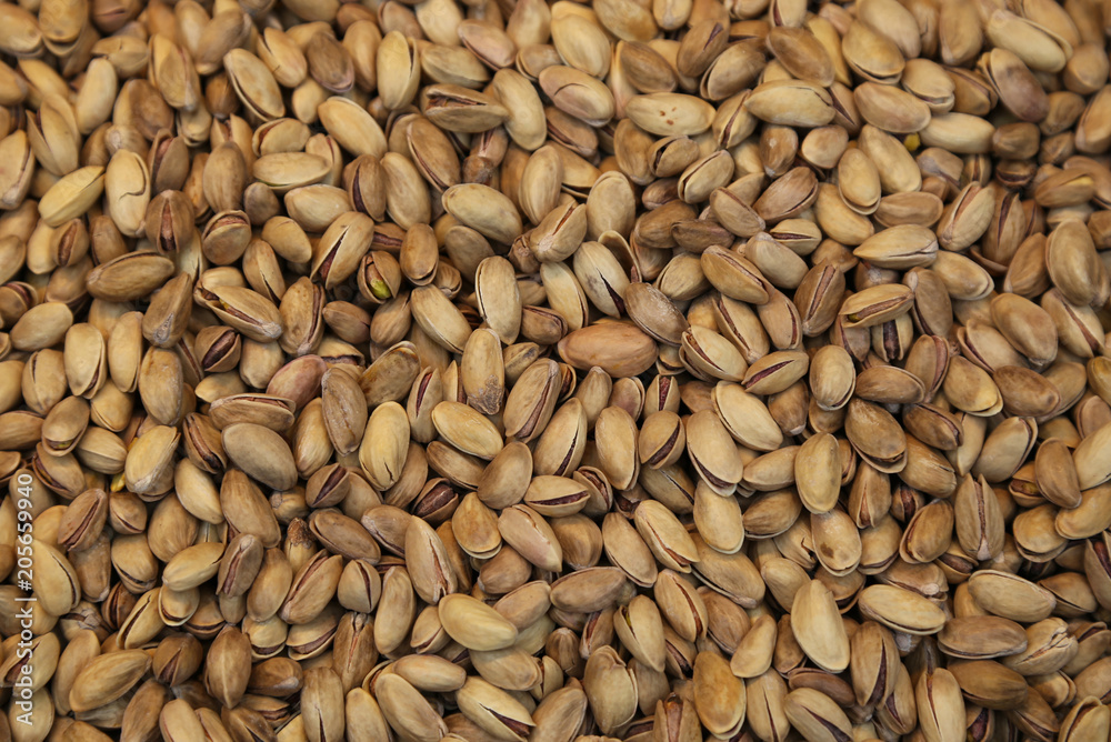 Pistachio texture. Nuts. Green fresh pistachios as texture Pistachio texture. Nuts. Green fresh pistachios as texture