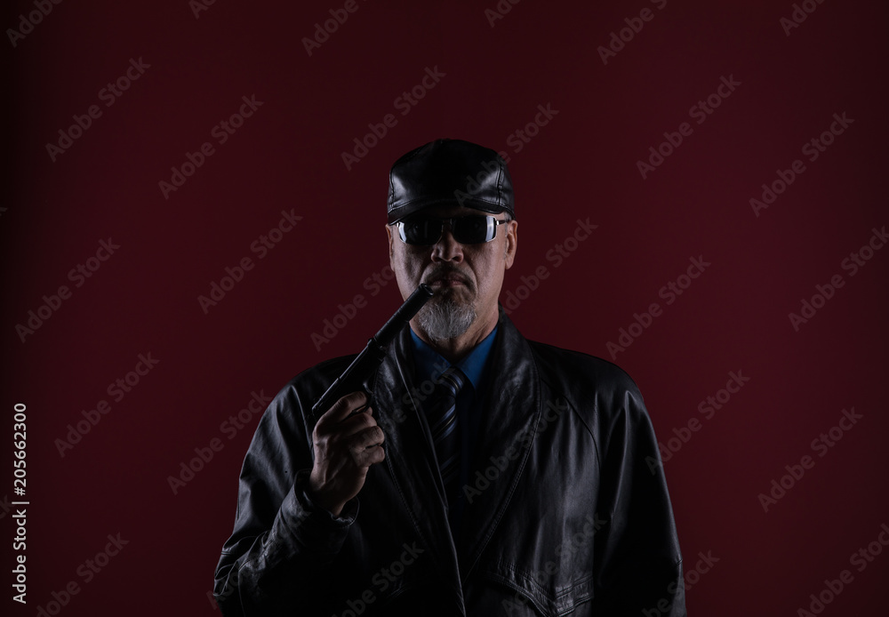 shadow portrait of the killer with a gun shadow portrait of the killer with a gun