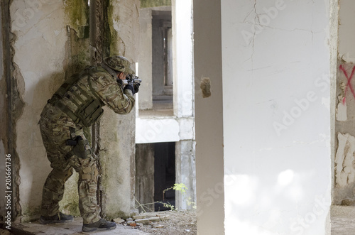 Soldier take cover inside building aim target 