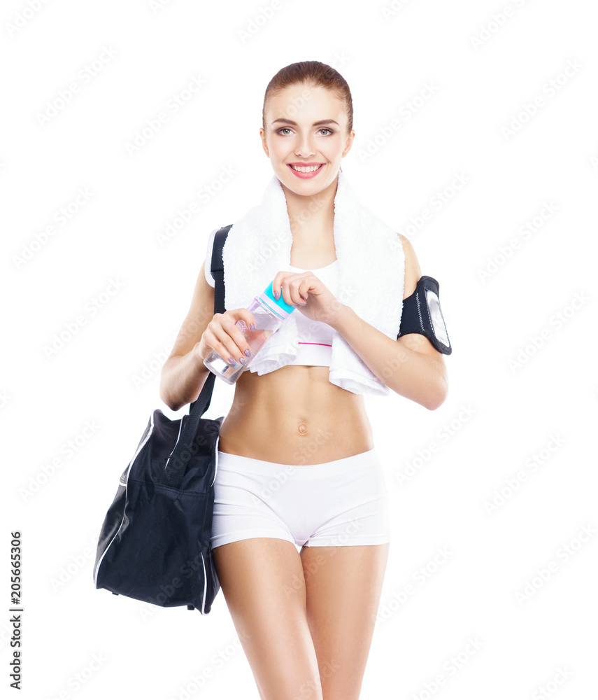 Young and sporty woman isolated on white background