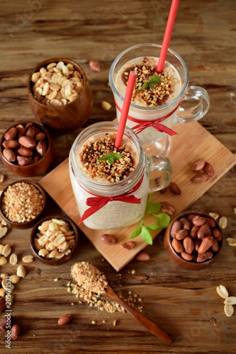 Protein cocktail with peanuts in a glass jar