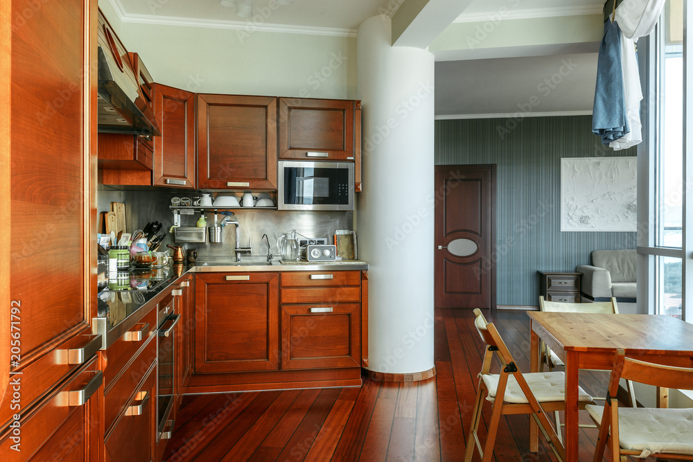 Interior of the modern kitchen and guest room