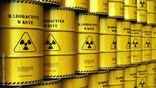 Group of stacked yellow drums with radioactive waste