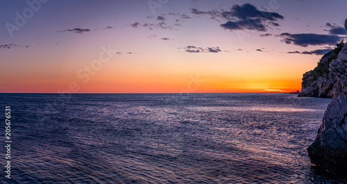 Beautiful sunset over the cliffs in Petrovac