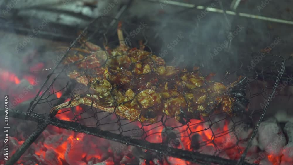 Seafood grilling over fire, ember. Seafood grill Seafood grilling over fire, ember. Seafood grill