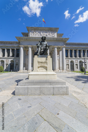 MADRID, SPAIN - MAY 15, 2018: Entrance of El Prado museum with a Statue of Velazquez