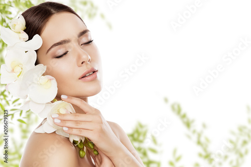 Beauty Skin Care and Face Makeup, Woman Skincare Natural Make Up, Beautiful Model and Orchid Flower, eyes closed