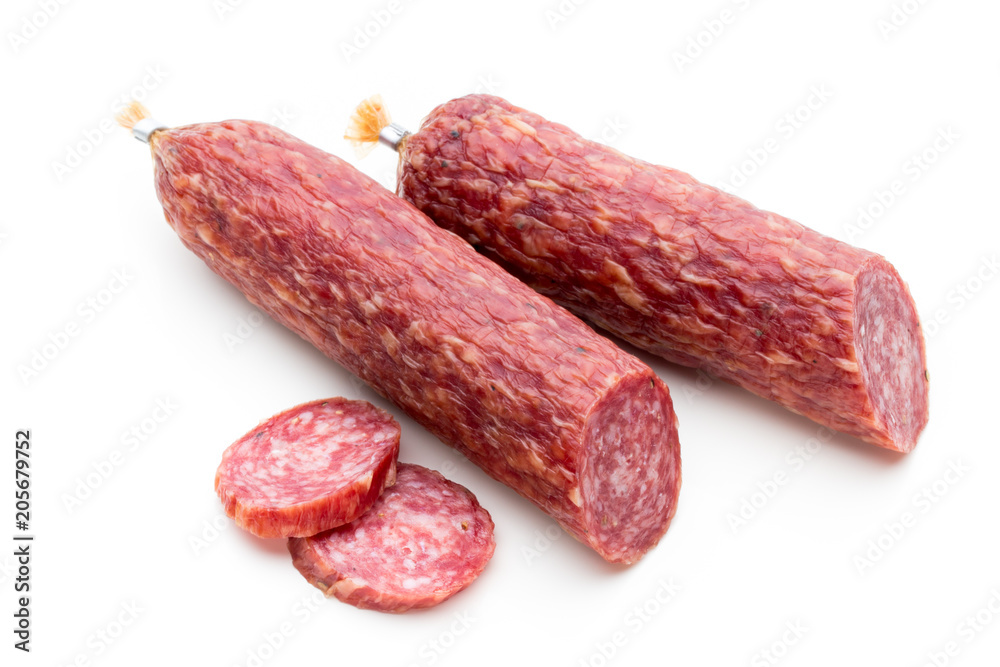 Salami smoked sausage, basil leaves and peppercorns isolated on white background. Salami smoked sausage, basil leaves and peppercorns isolated on white background.